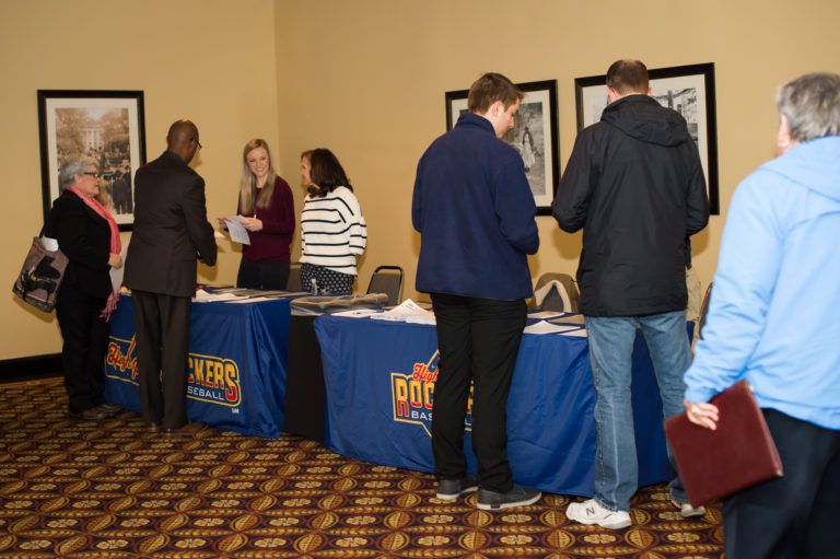 Potential employees networking at the Rockers job fair. 