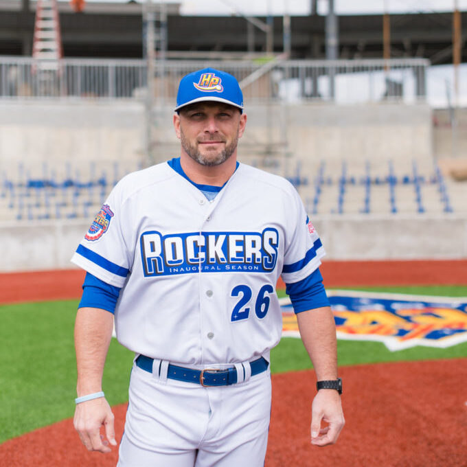 A photo of a High Point Rockers baseball player featuring their brand new jerseys