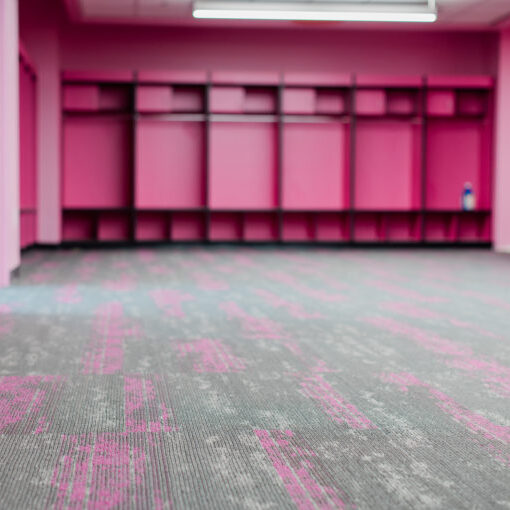 Pink lockers at the visiting locker room at the High Point Rockers stadium