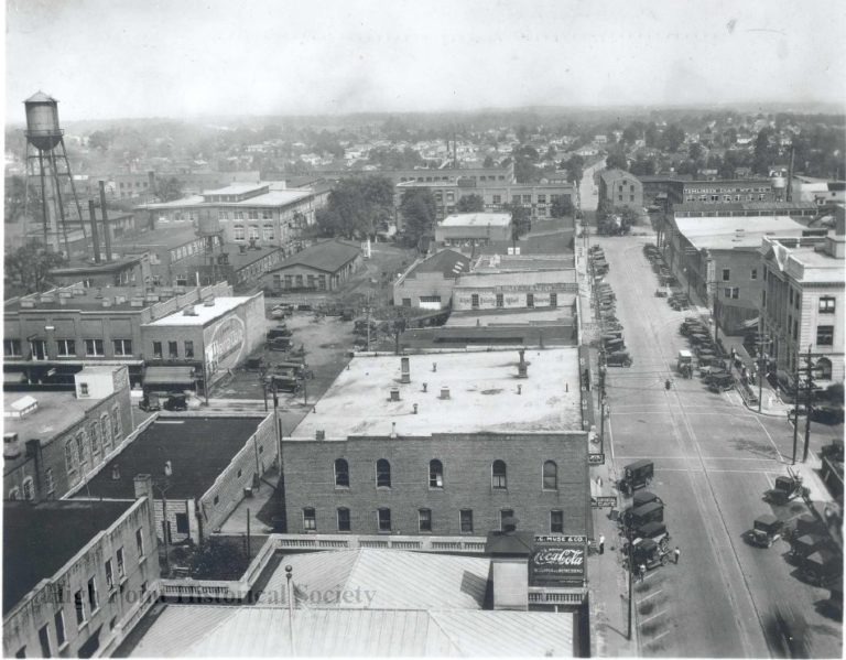 Black and white, aerial view of East Commerce Street and High Point's Factory District.
