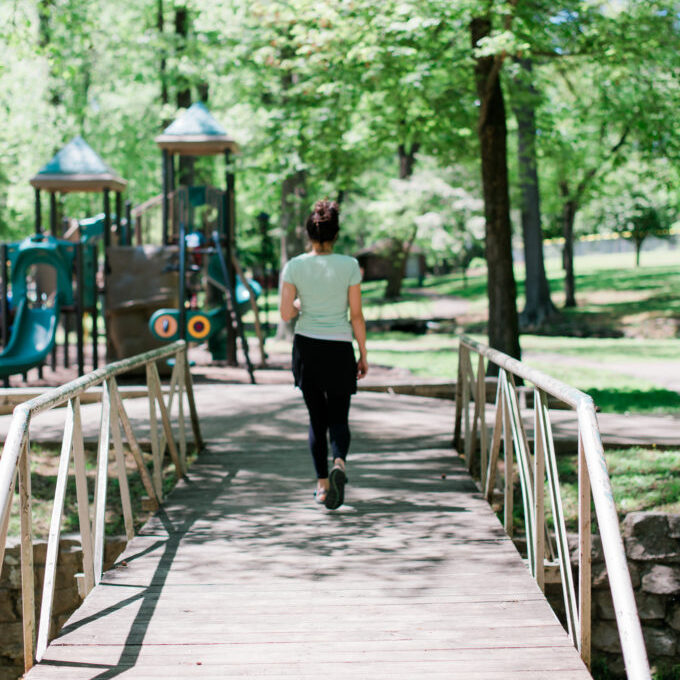 Image of a female running in Armstrong Park in High Point, NC