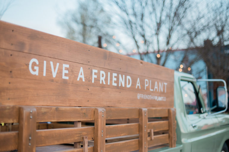 The Friendship Plant Co. truck parked outside