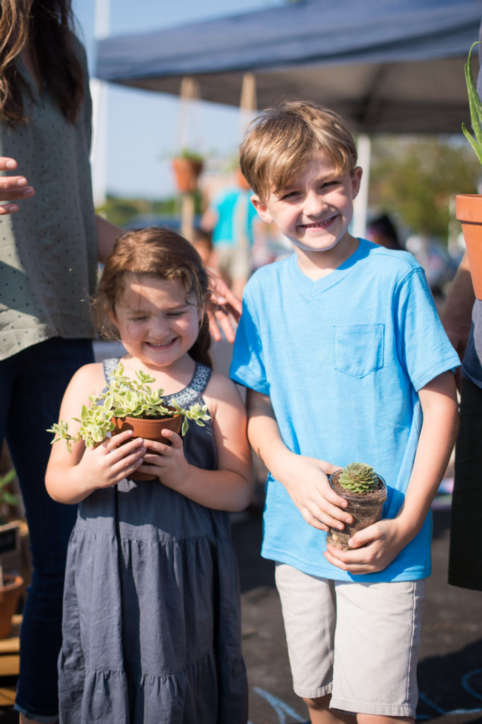 Evan and Heather Blackerbys kids hold succulents 