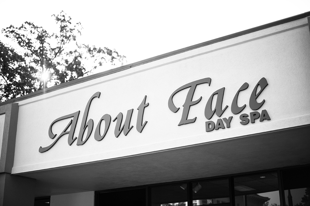The sign from "About Face" day spa.