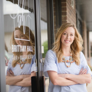 Brittany Hall stands outside of her High Point salon, Brittany Hall Hair and Makeup Design in High Point, NC