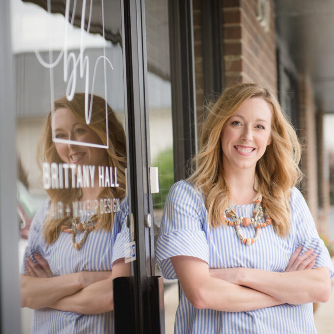 Brittany Hall stands outside of her High Point salon, Brittany Hall Hair and Makeup Design in High Point, NC