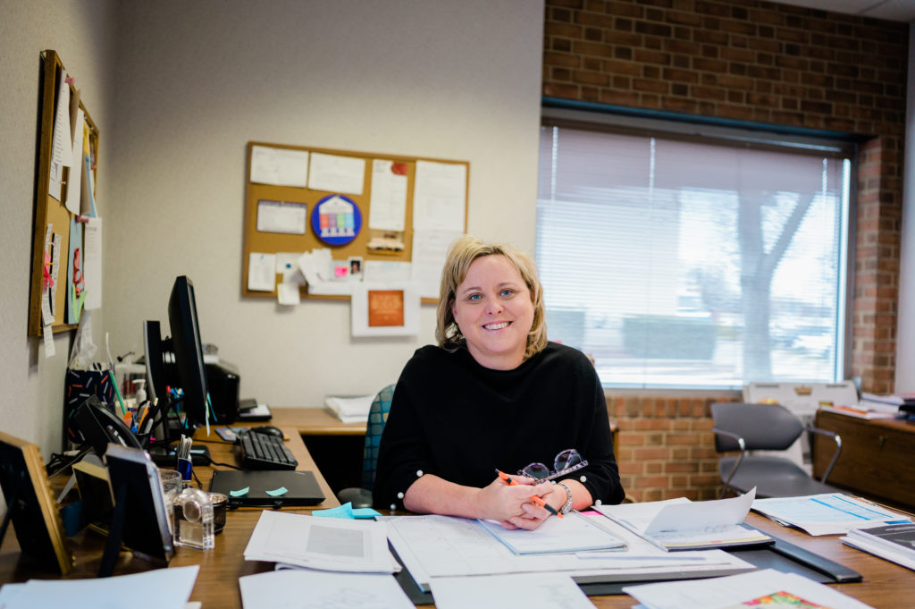 Molly Jordan, Executive Director at CCHP sits at her desk in the Community Clinic of High Point.