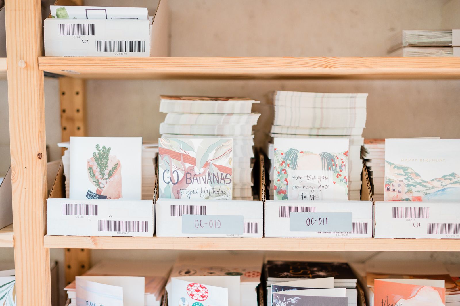 A shelf of hand-drawn cards from Pen+Pillar in High Point.