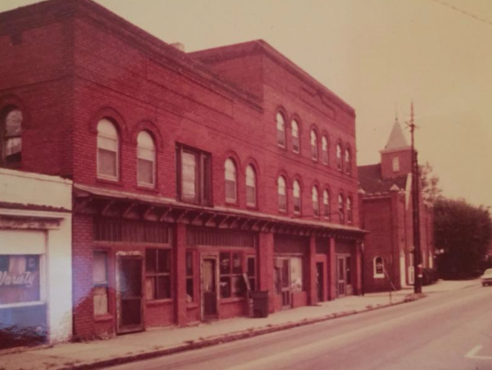 A historic image of the Kilby Hotel and arcade building in High Point, NC.