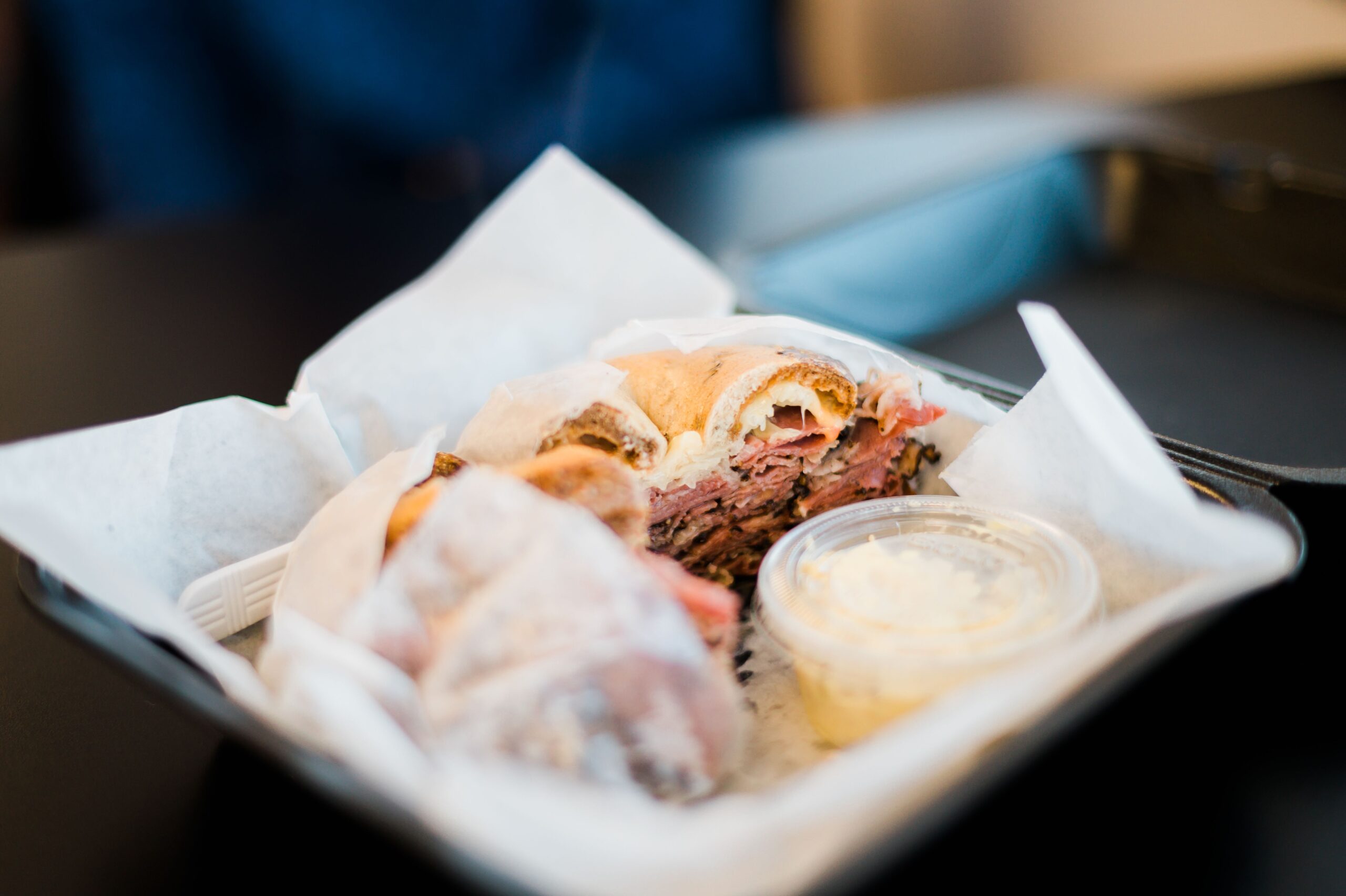 A pastrami bagel at High Point Bagels sits in a to-go box in High Point, NC.