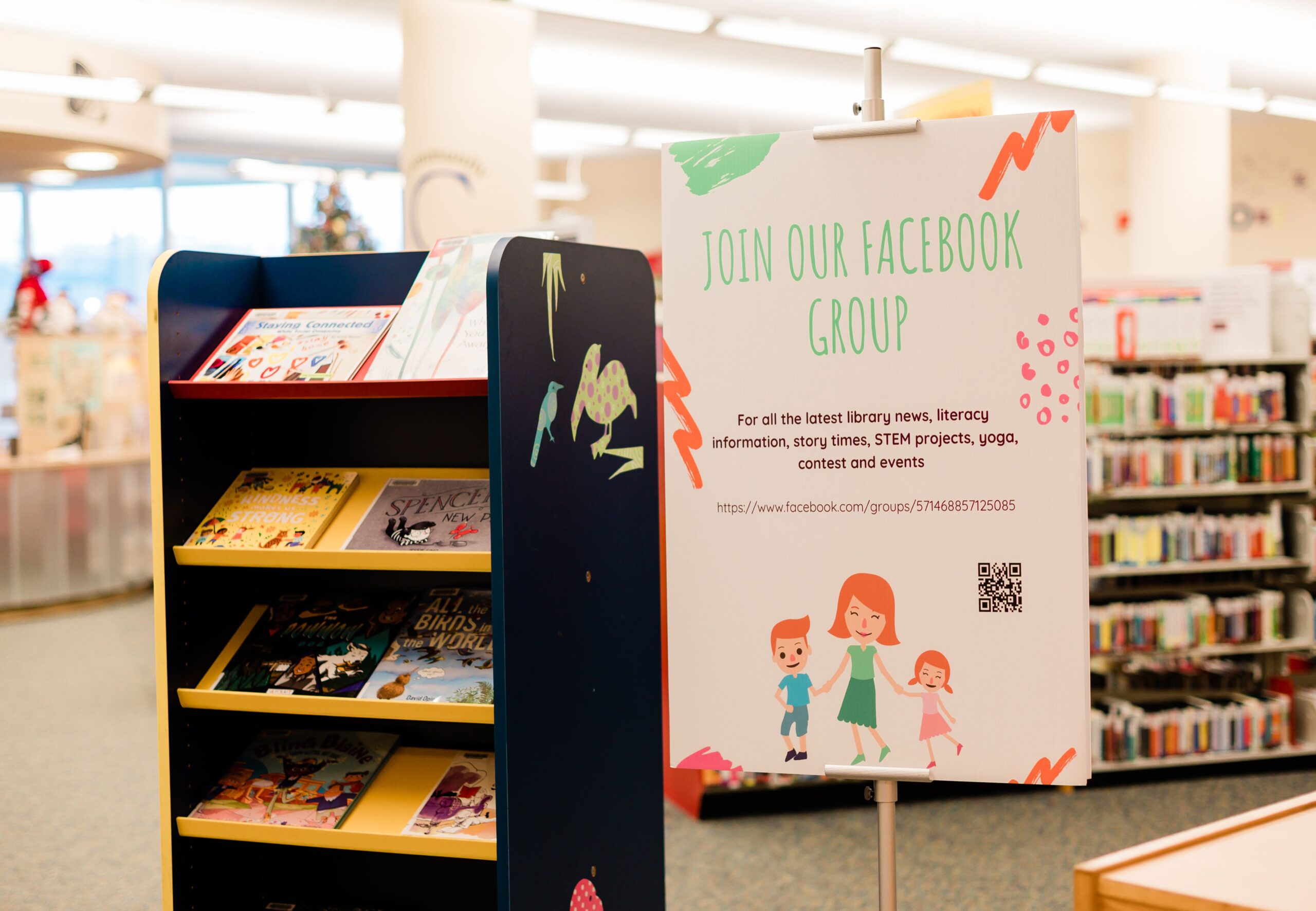 A sign at High Point Public Library sharing the news about how to join the HPPL kids' Facebook group.