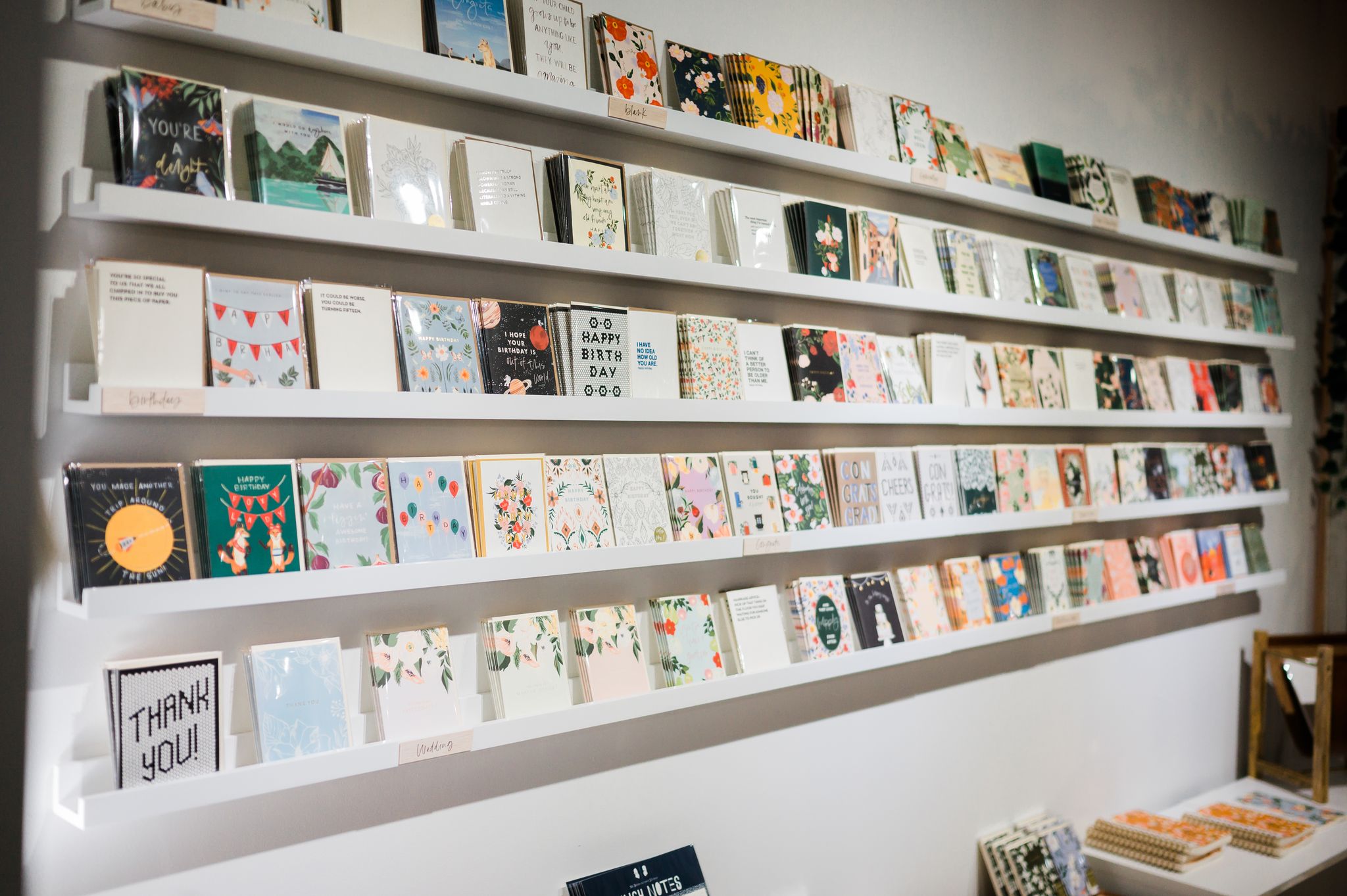Rows of cards on display at Pen+Pillar's storefront in High Point, NC.