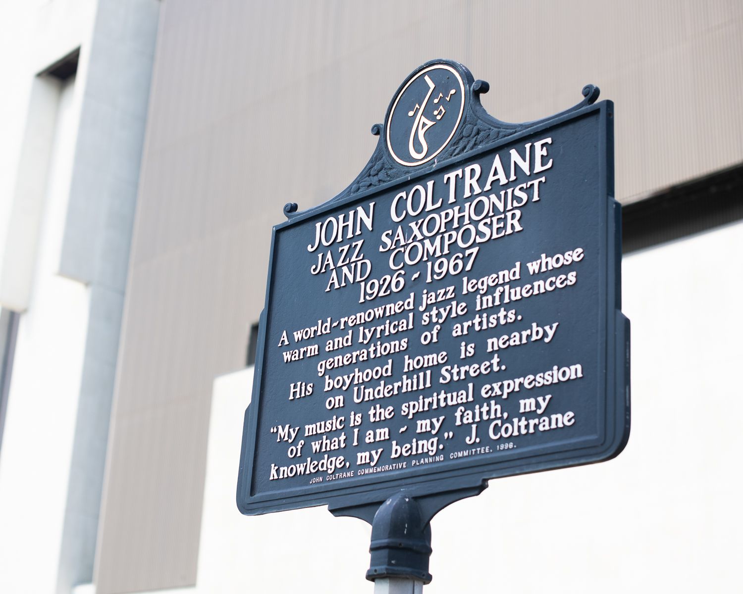 A sign describing John Coltrane's impact on jazz music.