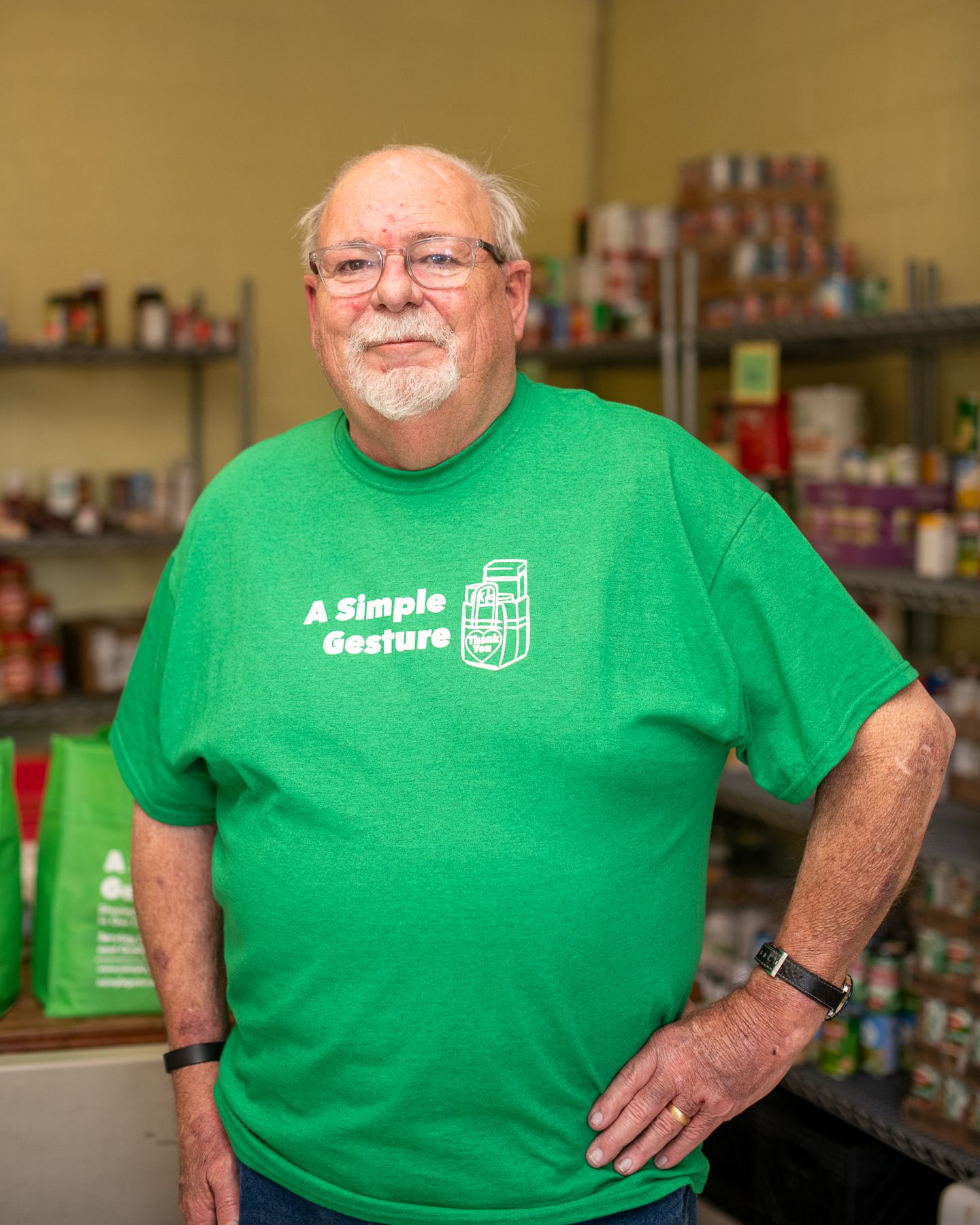 David Lees, Director of Volunteers at A Simple Gesture in High Point, NC stands in the West End Ministries food pantry.
