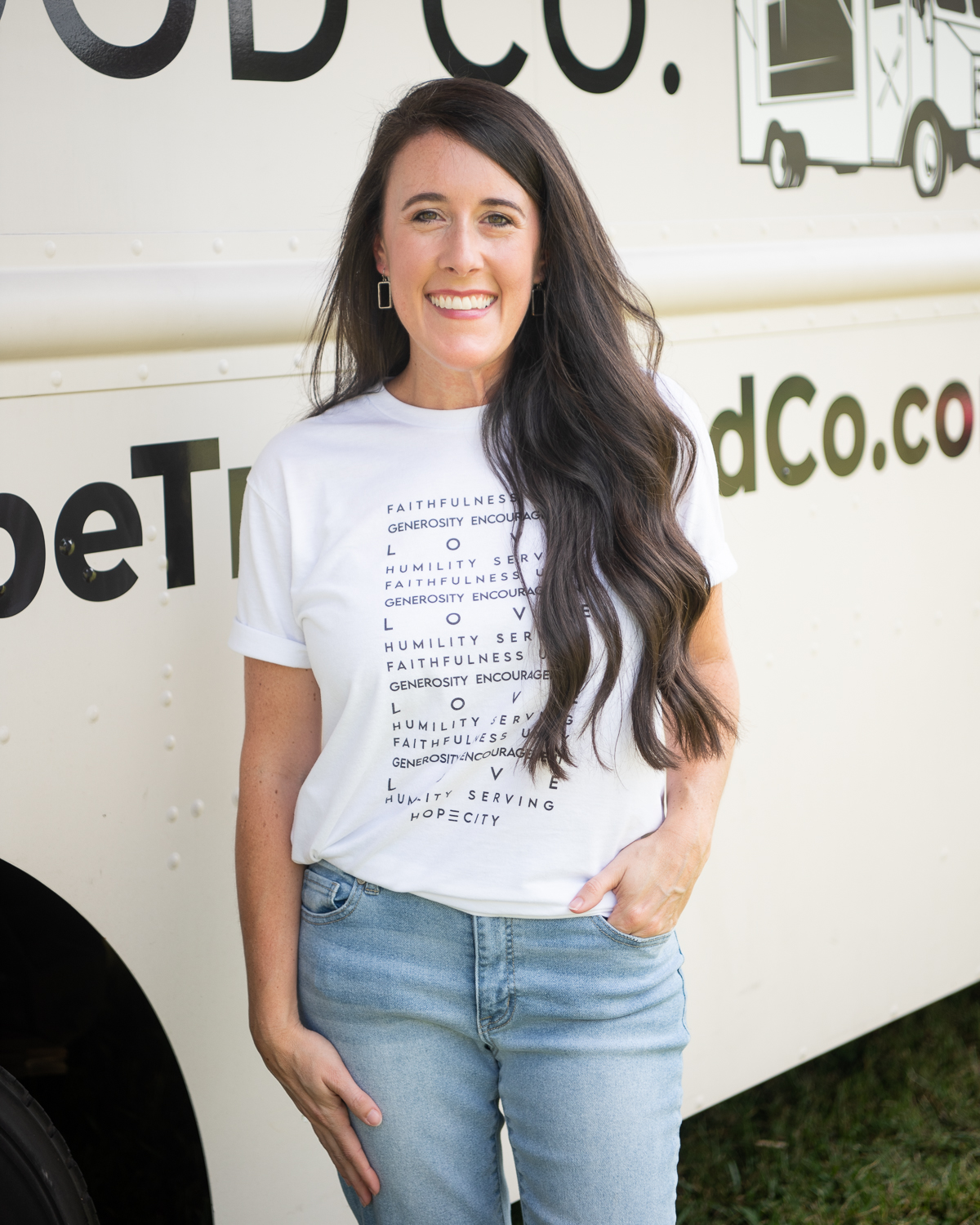 Jamie Vie, Executive Director of Hope Food Co. stands in front of the food truck in High Point, NC.