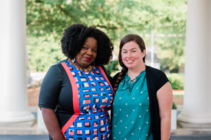 Lucinda Johnson and Laura Blythe-Goodman, educators in High Point stand together smiling.