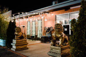 The patio of 98 Asian Bistro at night in High Point, NC