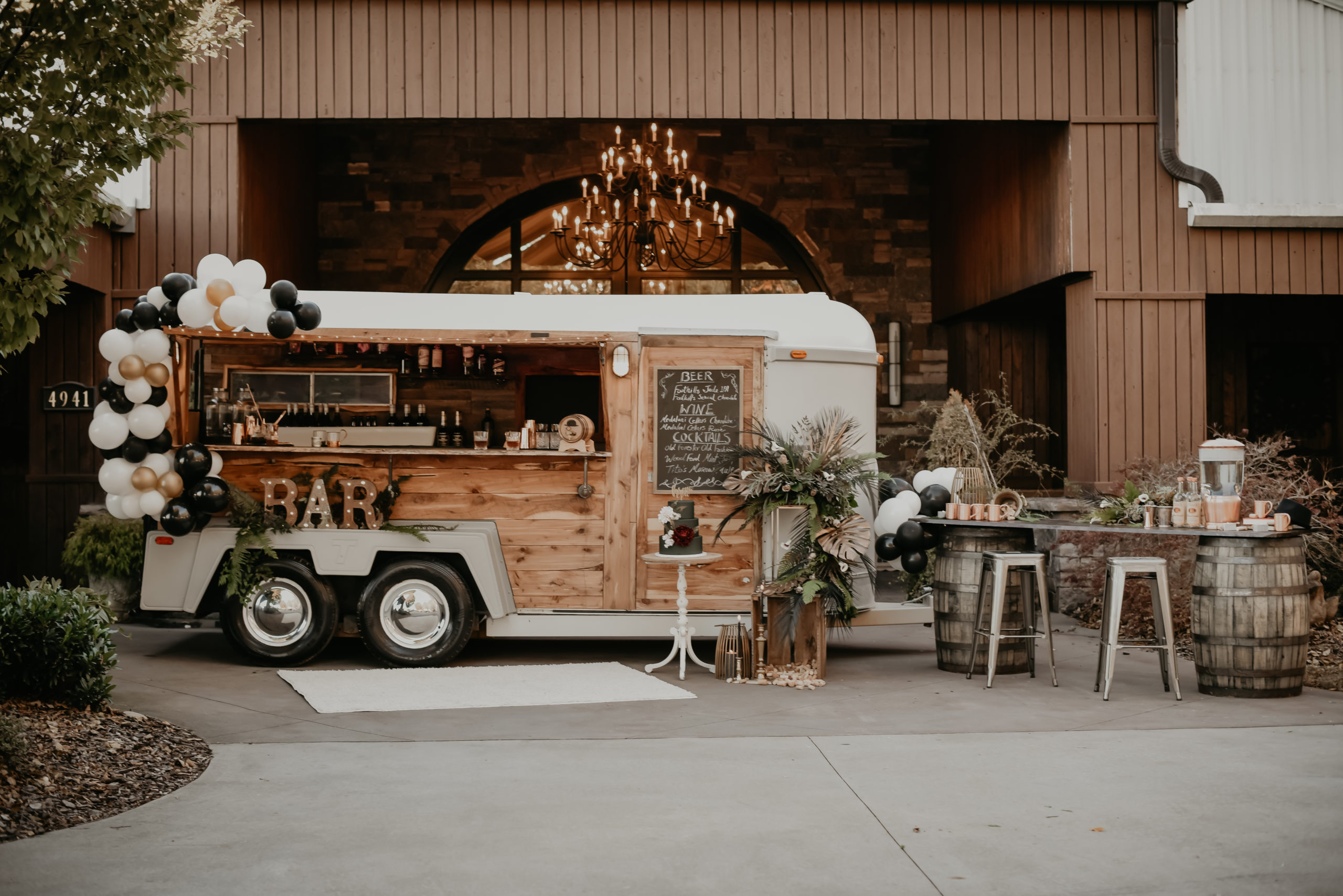 Proper Pour Events, a mobile bar in High Point, NC is made of a horse trailer.