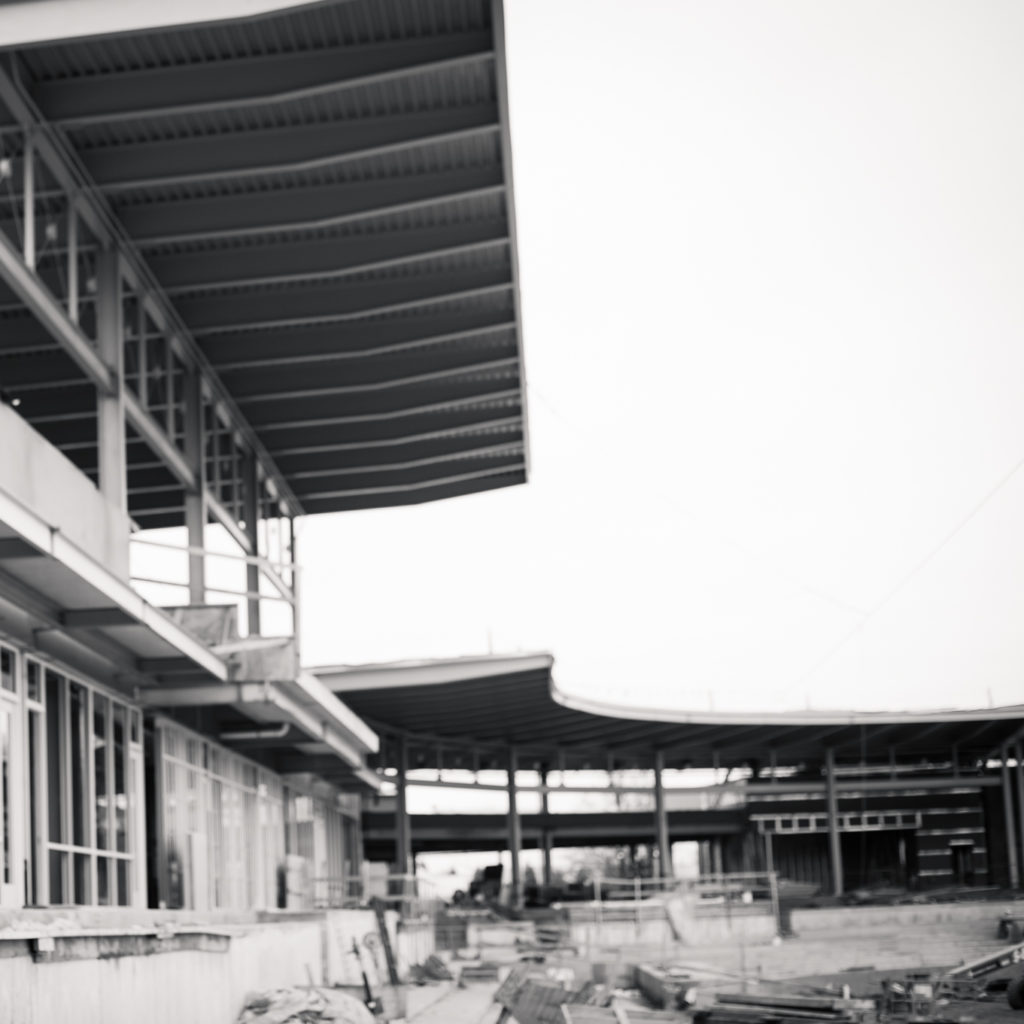 A black and white feature image of the construction of the Rockers Stadium in High Point, NC