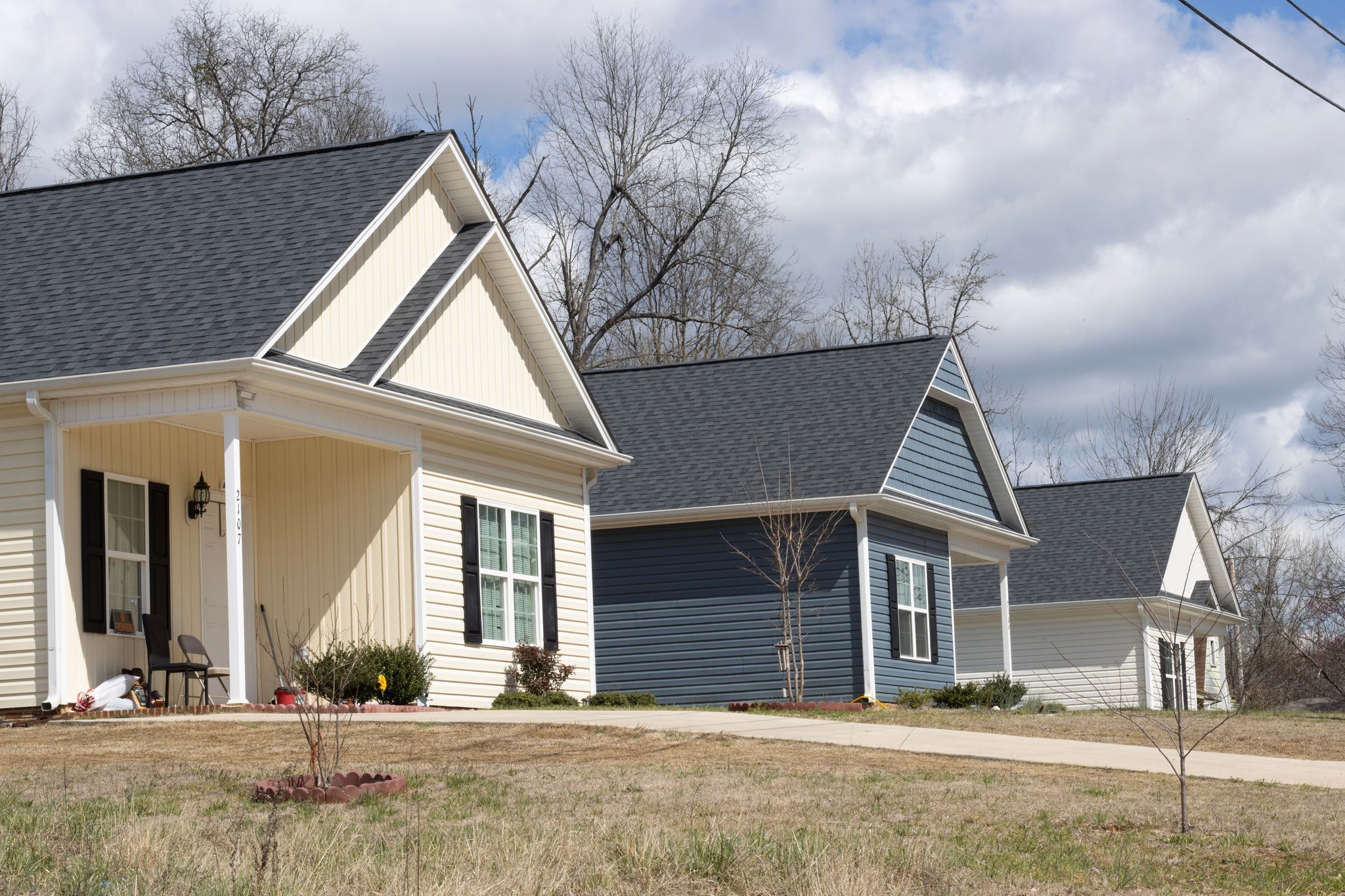 A row of new construction houses in High Point, NC stand as part of the Pinnacle FInancial Partners program.