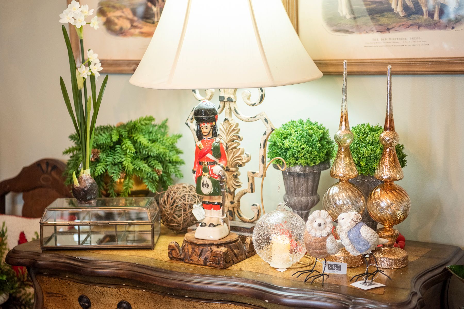 A table with displays of different pieces of home decor at The Cottage in High Point.