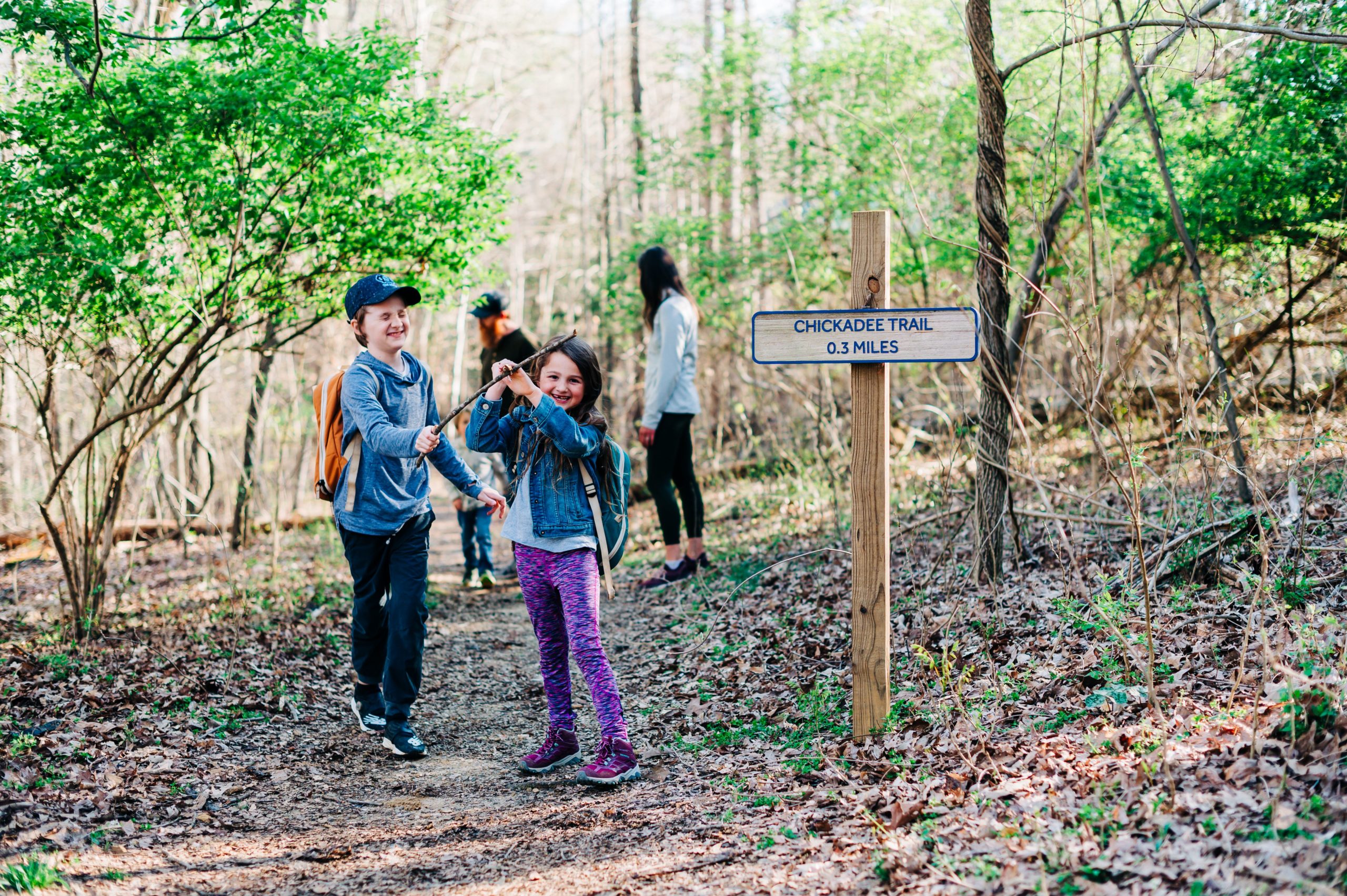 Kids hiking in High Point, NC at Piedmont Environmental Center.