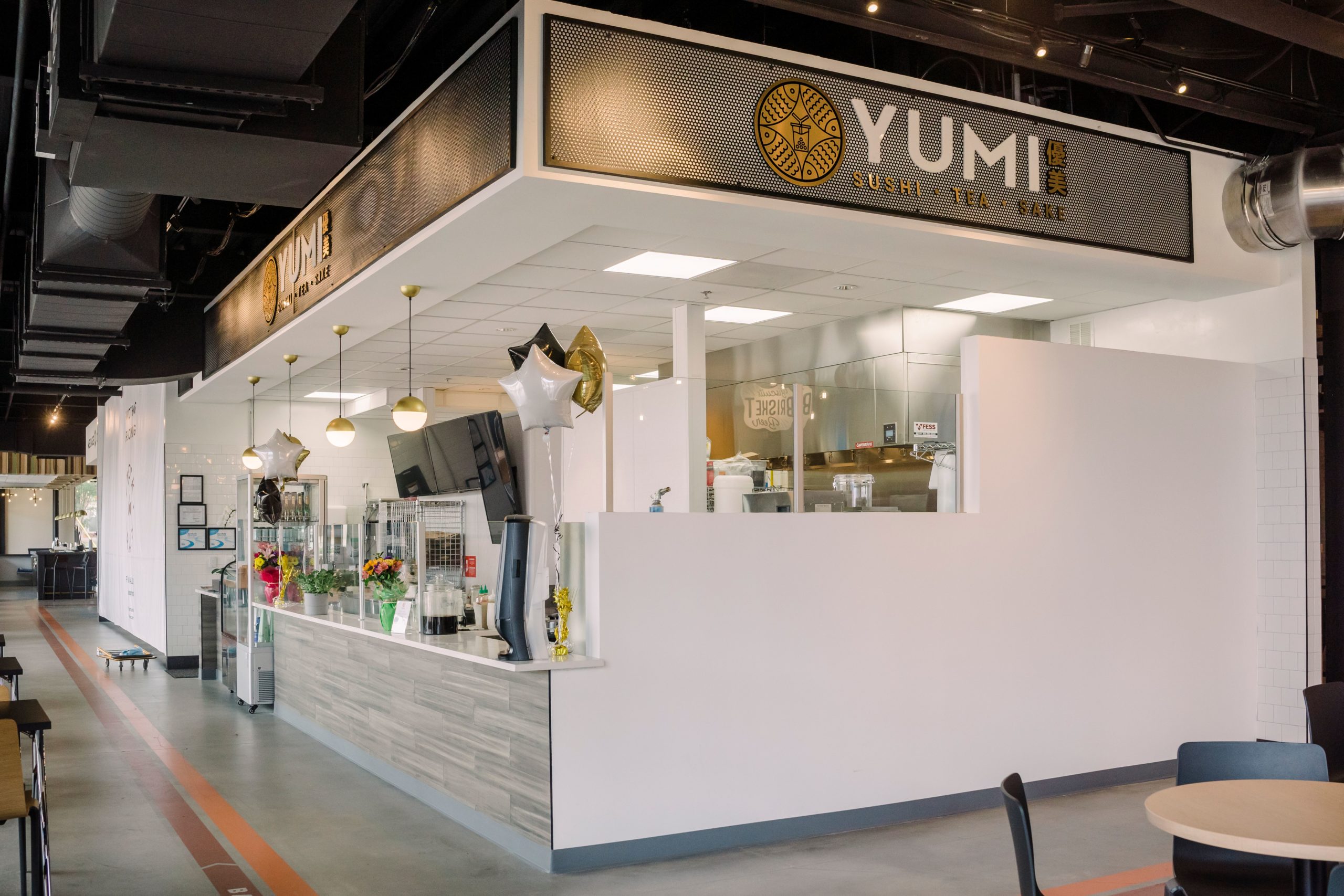The exterior of the Yumi Sushi spot in the Stock and Grain Assembly, the first food hall in High Point, NC.