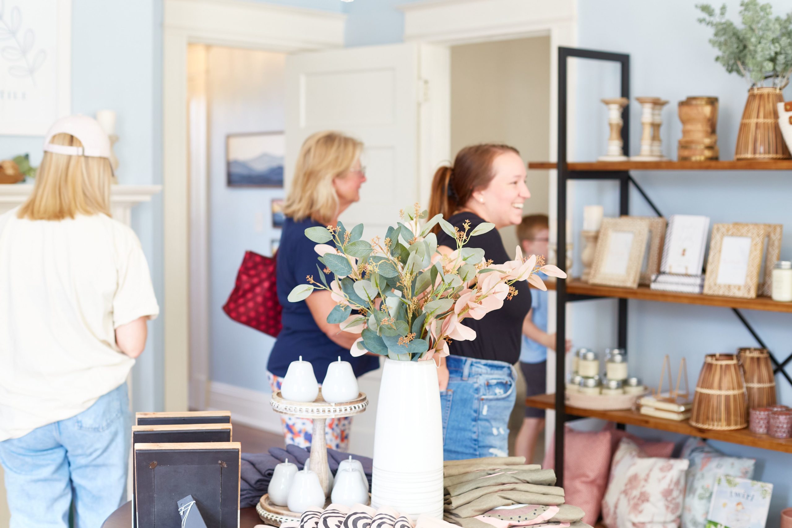 Shoppers browse in the High Point, NC home goods store, The Mantel Mercantile.