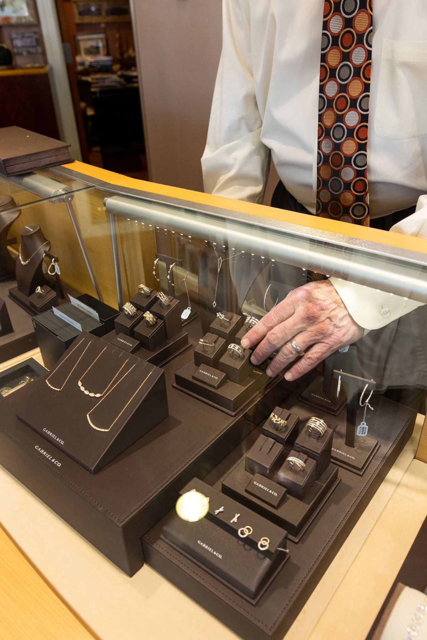 A case of necklaces, earrings and other fine jewelry pieces in a case at Simon Jewelers in High Point, NC.
