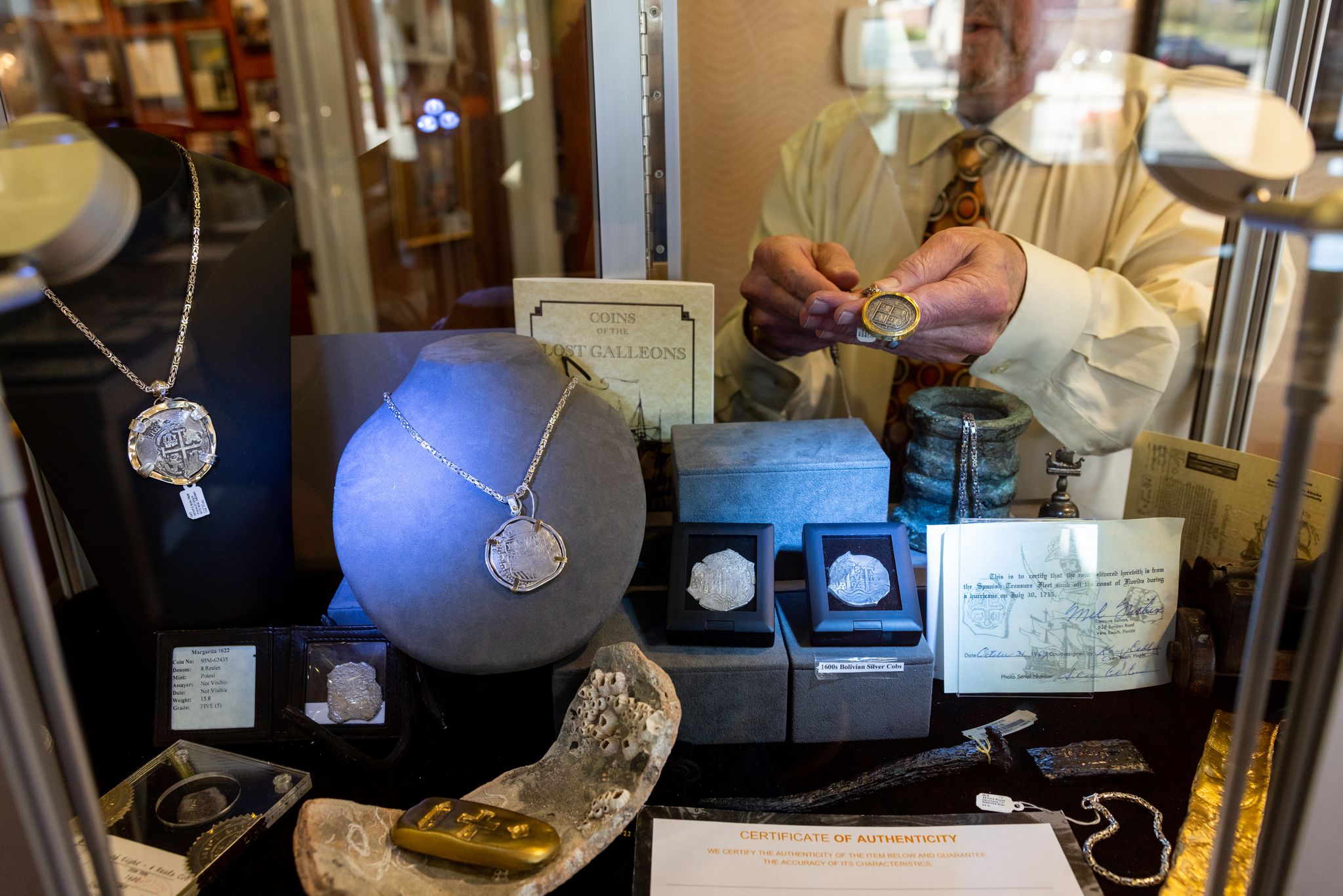Gary Simon displays his rare coin and treasure collection in his shop in High Point, NC.