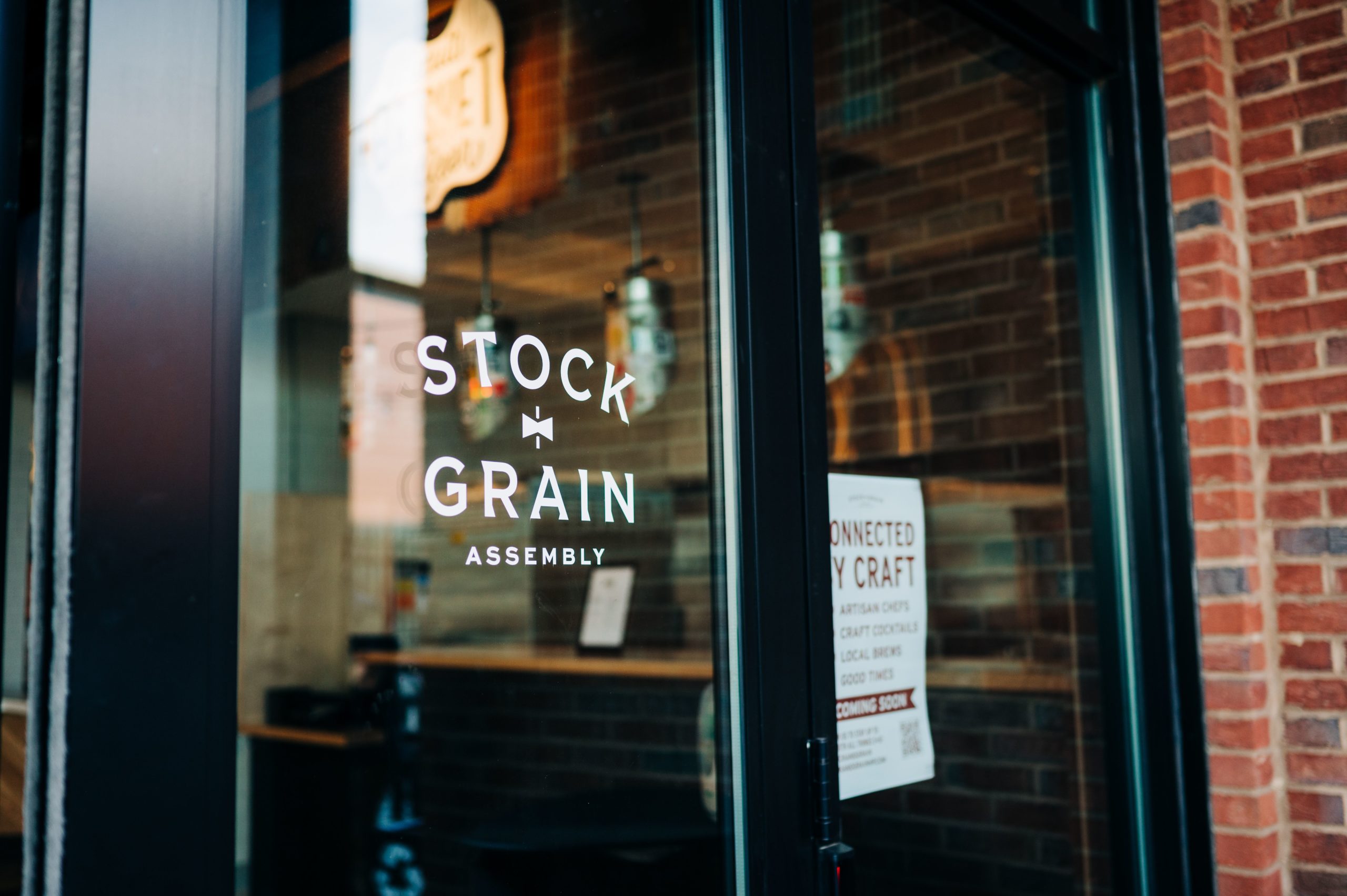 The door to High Point's Food Hall, Stock+Grain Assembly.