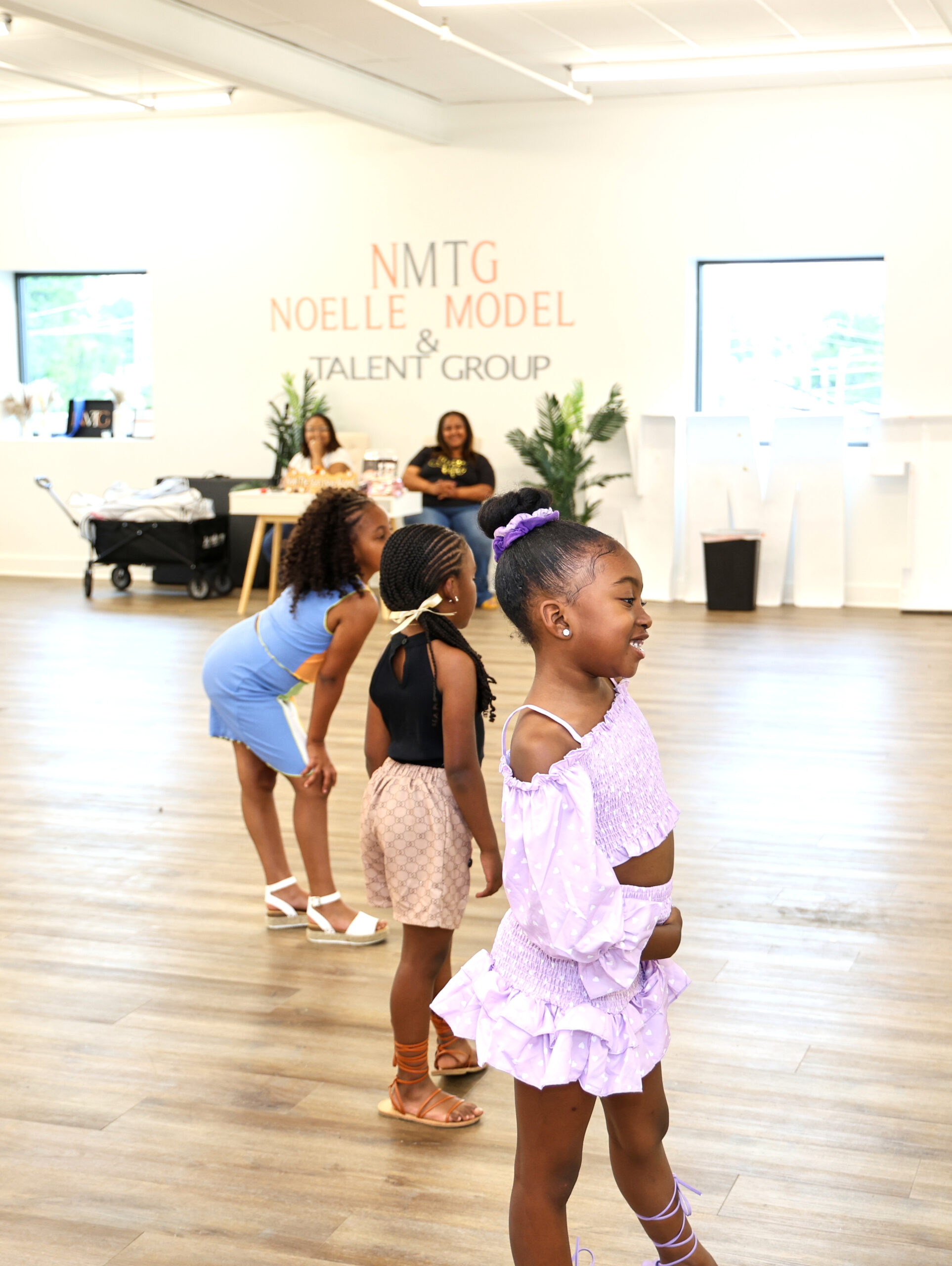 Kids at Noelle Model Talent Group practicing their modeling.